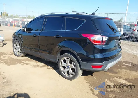 2018 Ford Escape Titanium z USA, uszkodzony, nr VIN 1FMCU0J91JUA20004